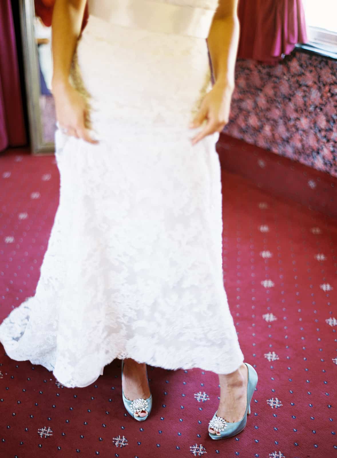 Bride showing off her Badgley Mischka shoes