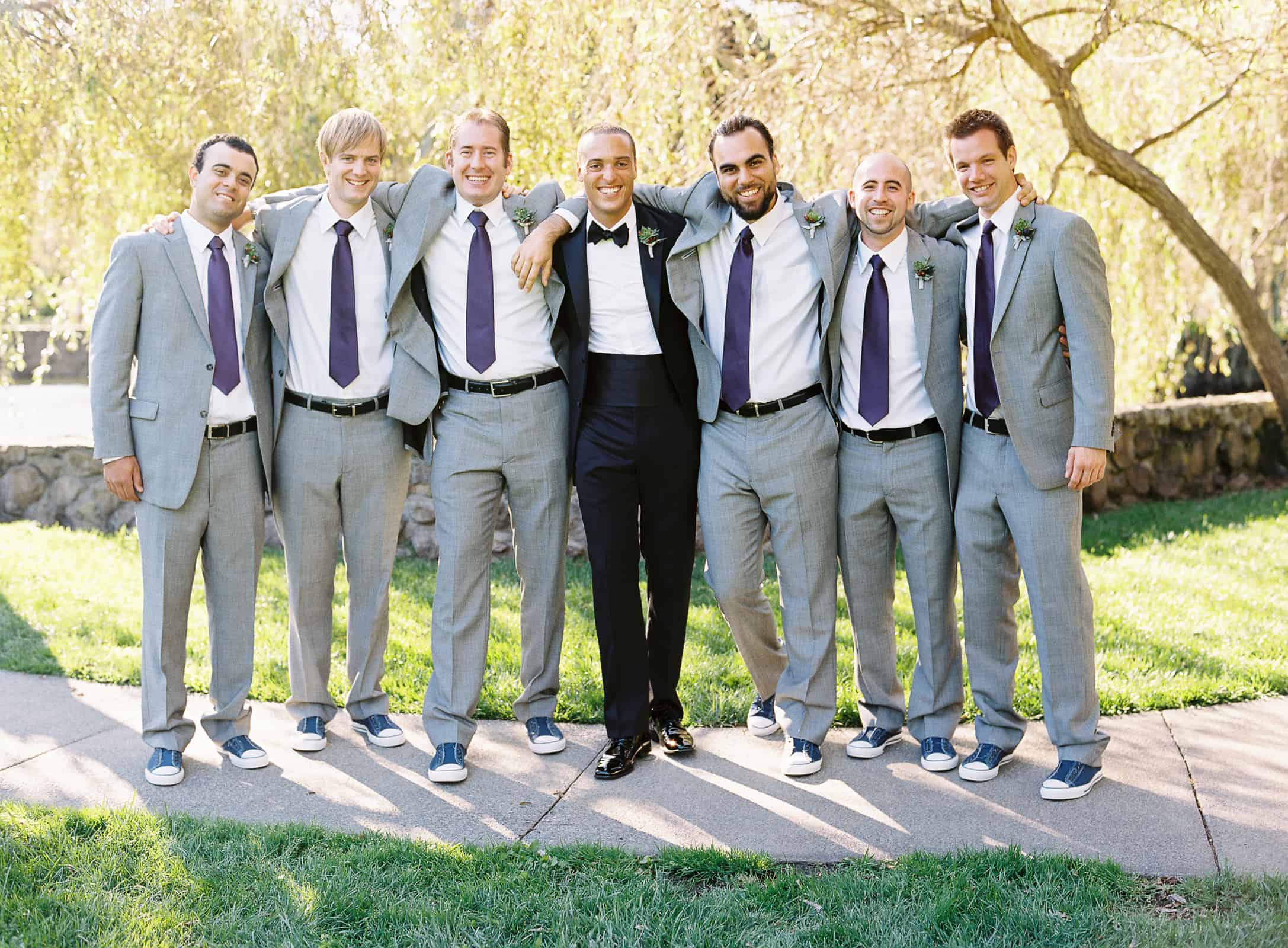 Groomsmen in light gray suits
