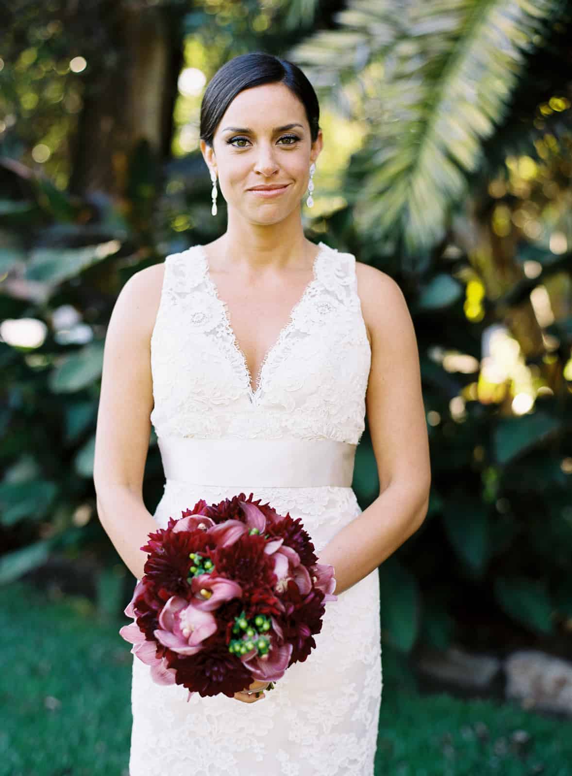Bride portrait with maroon bouquet