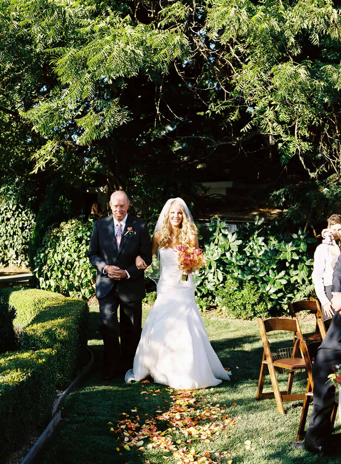 Father walking bride down the aisle