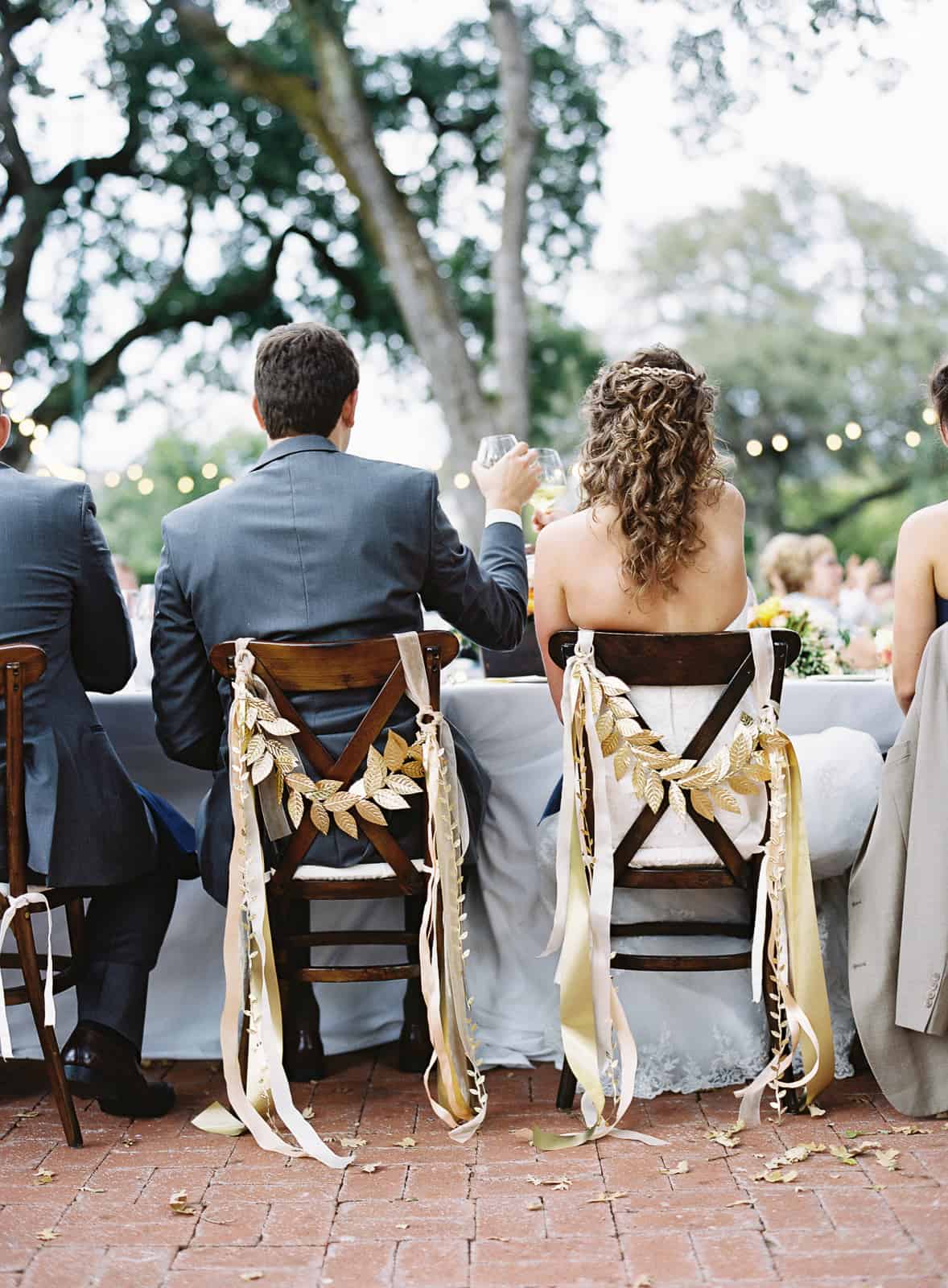 head table chairs decorated with gold leaves