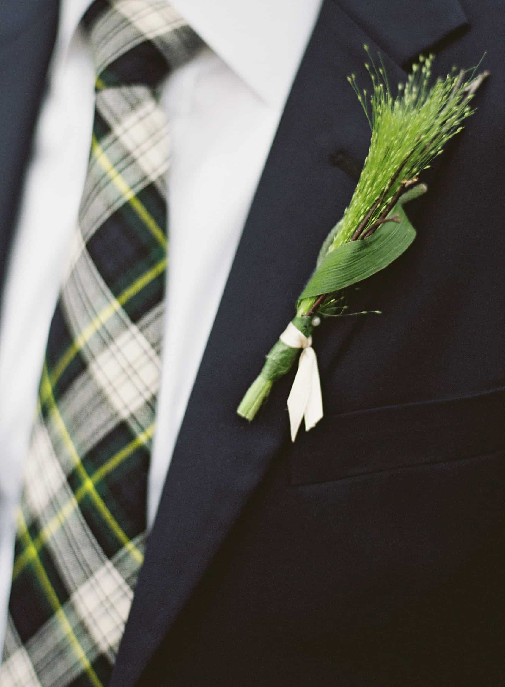 Green Boutonniere and tartan tie