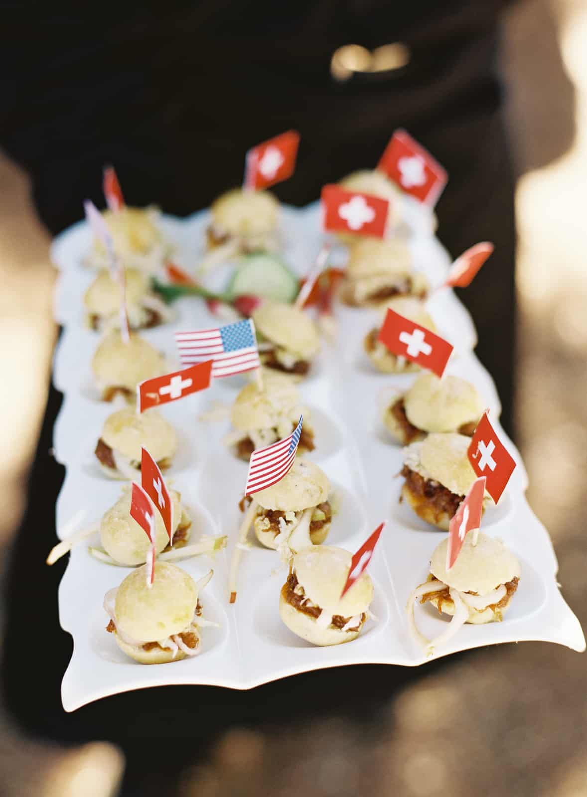 slider appetizers with swiss and american flags