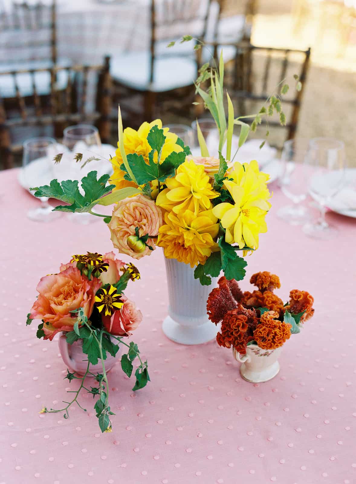 Yellow orange and red flower centerpieces