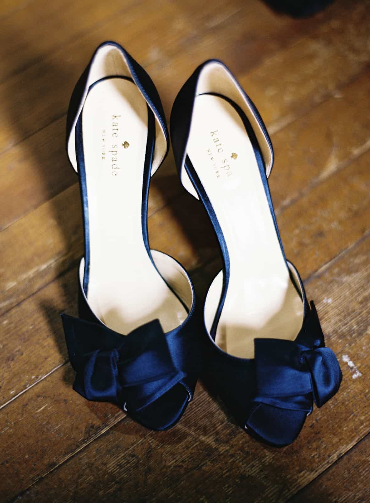blue kate spade shoes with a blue bow