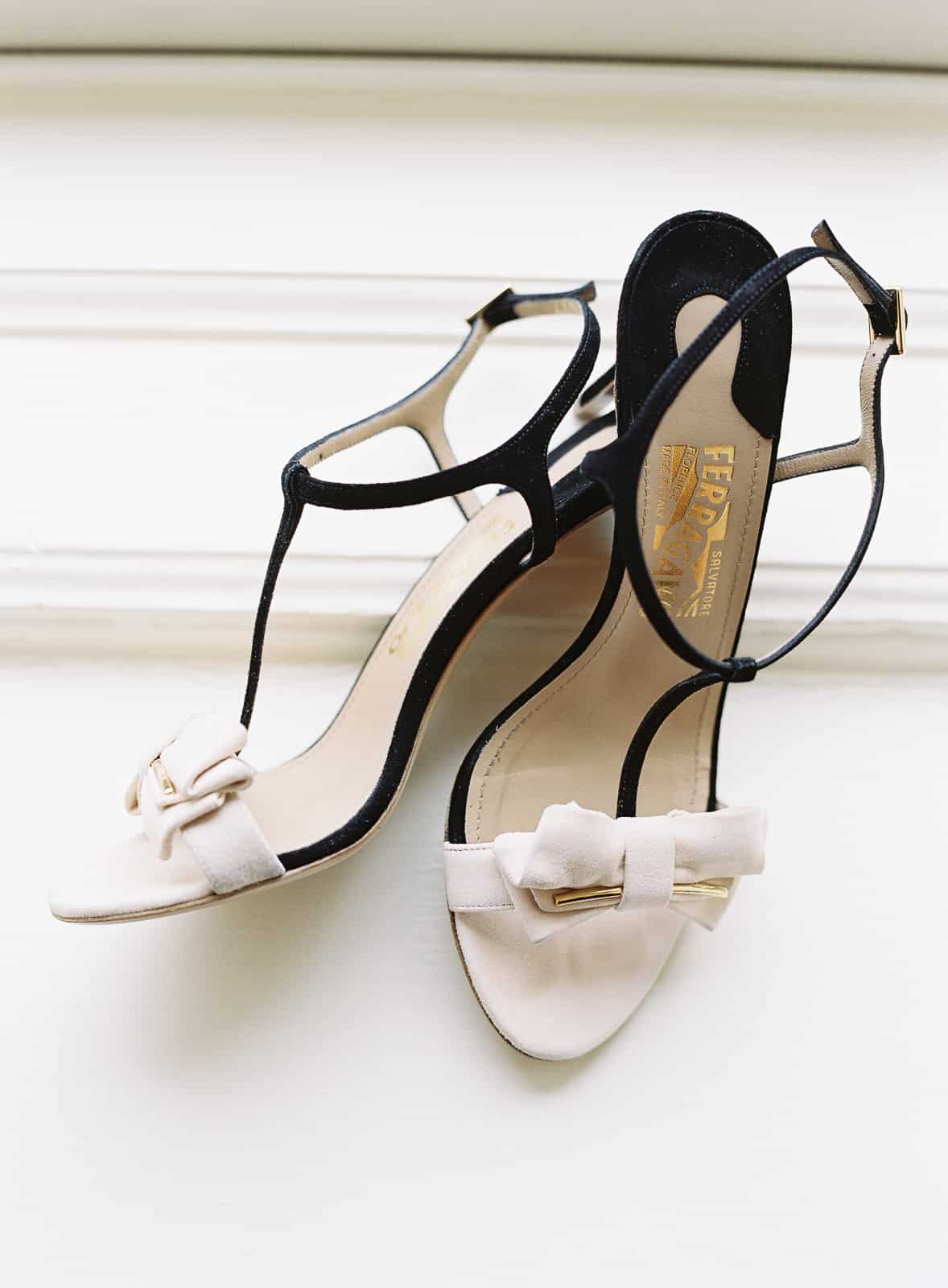 detail shot of white and black ferragamo shoes