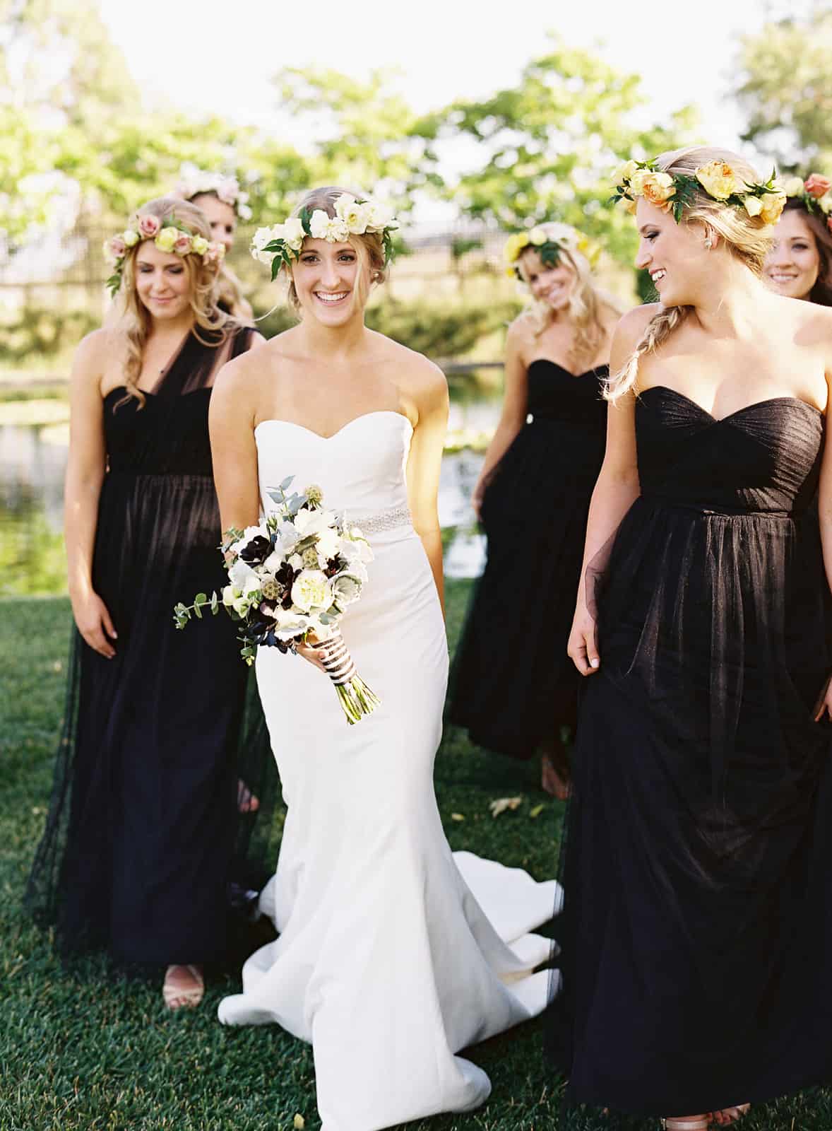 candid bride and bridesmaids laughing