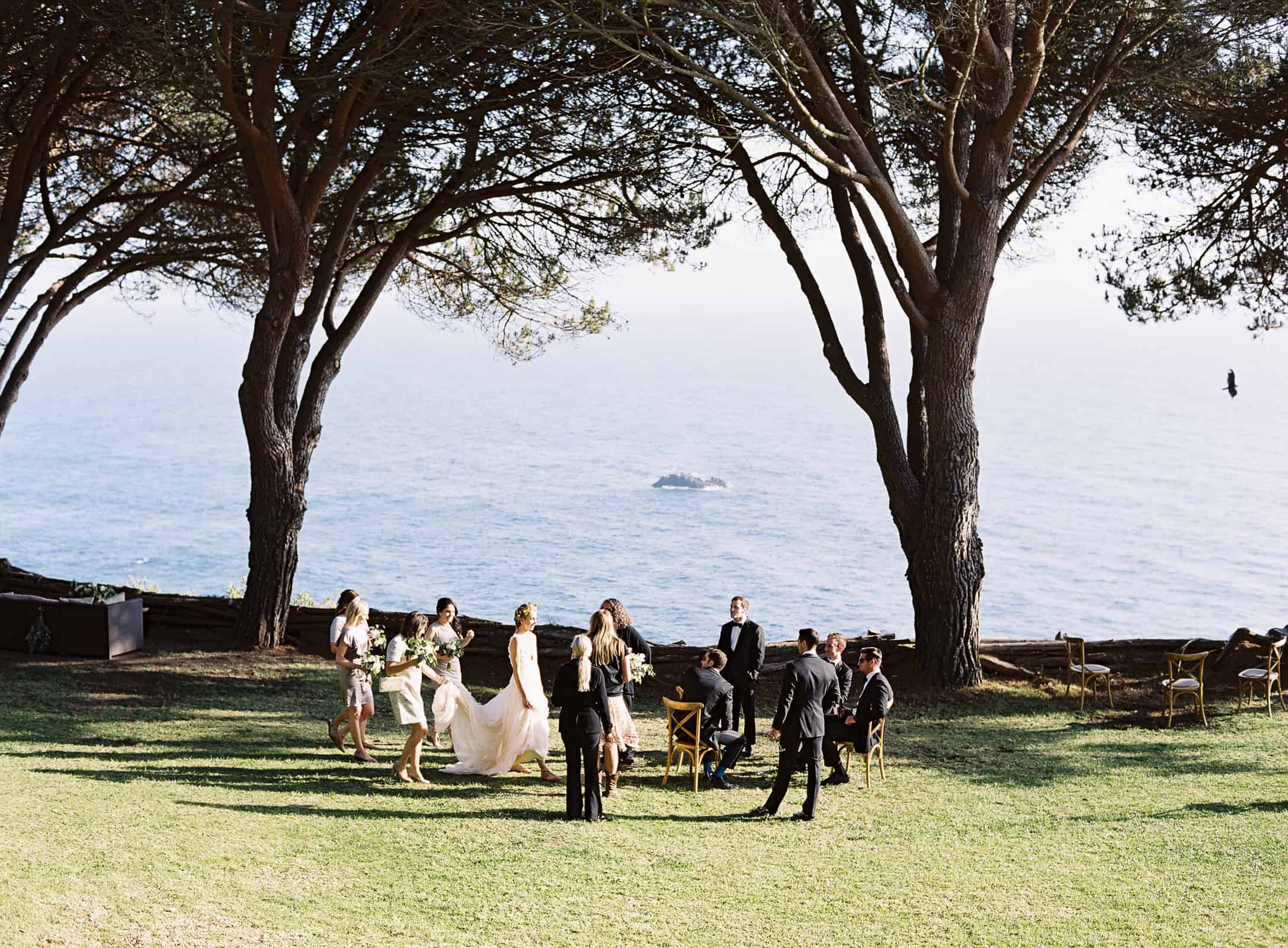 bridal party by the ocean