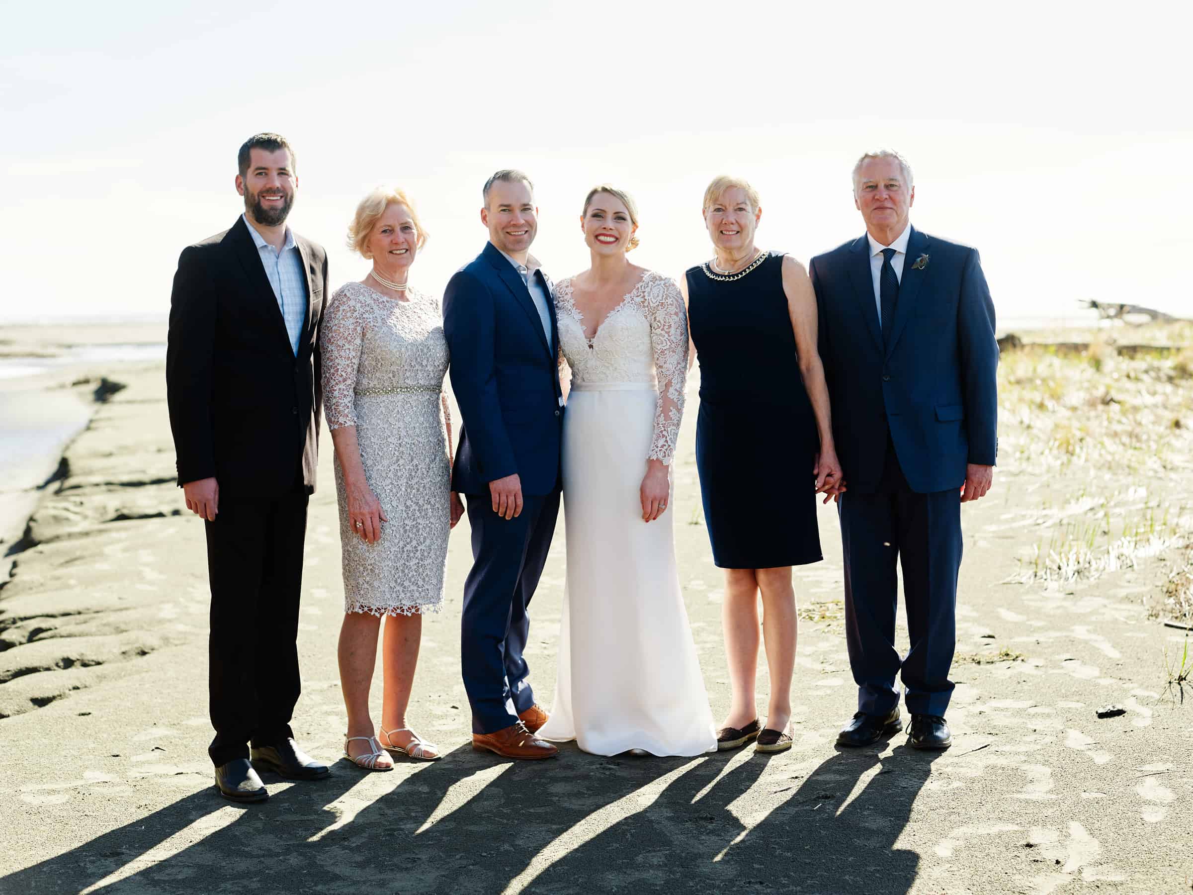 formal group portrait on beach