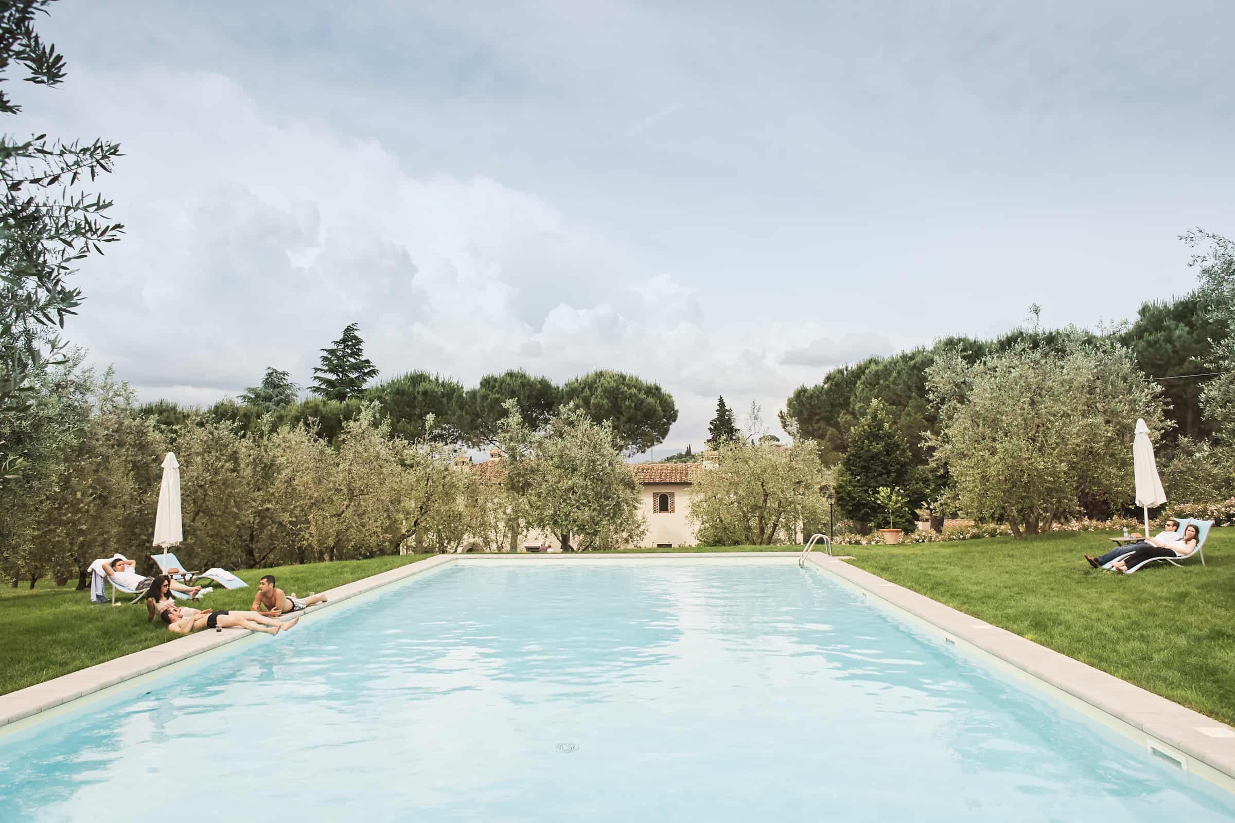 pool and people at Villa Poggio ai Merli