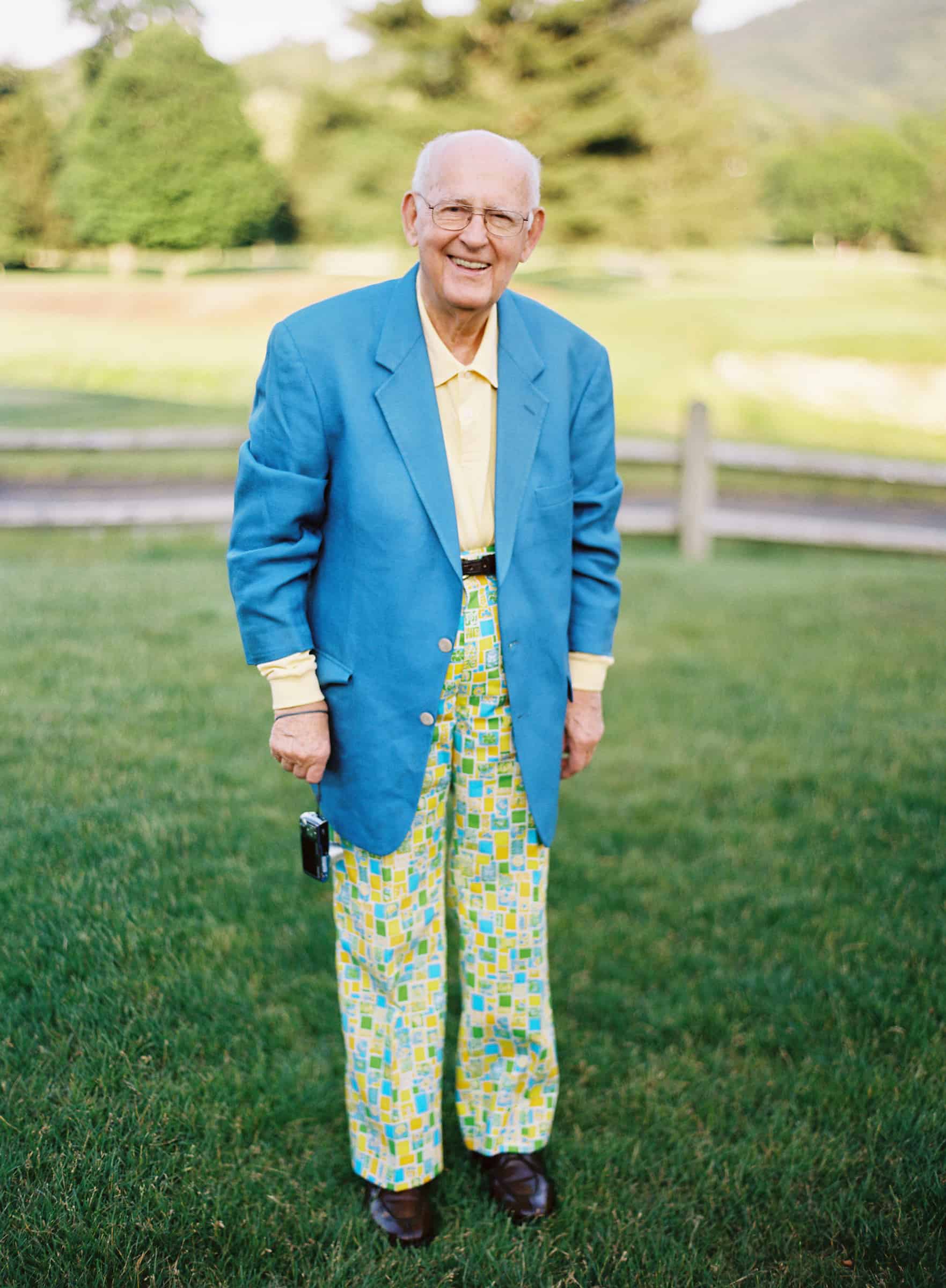 old man in a stylish colorful suit