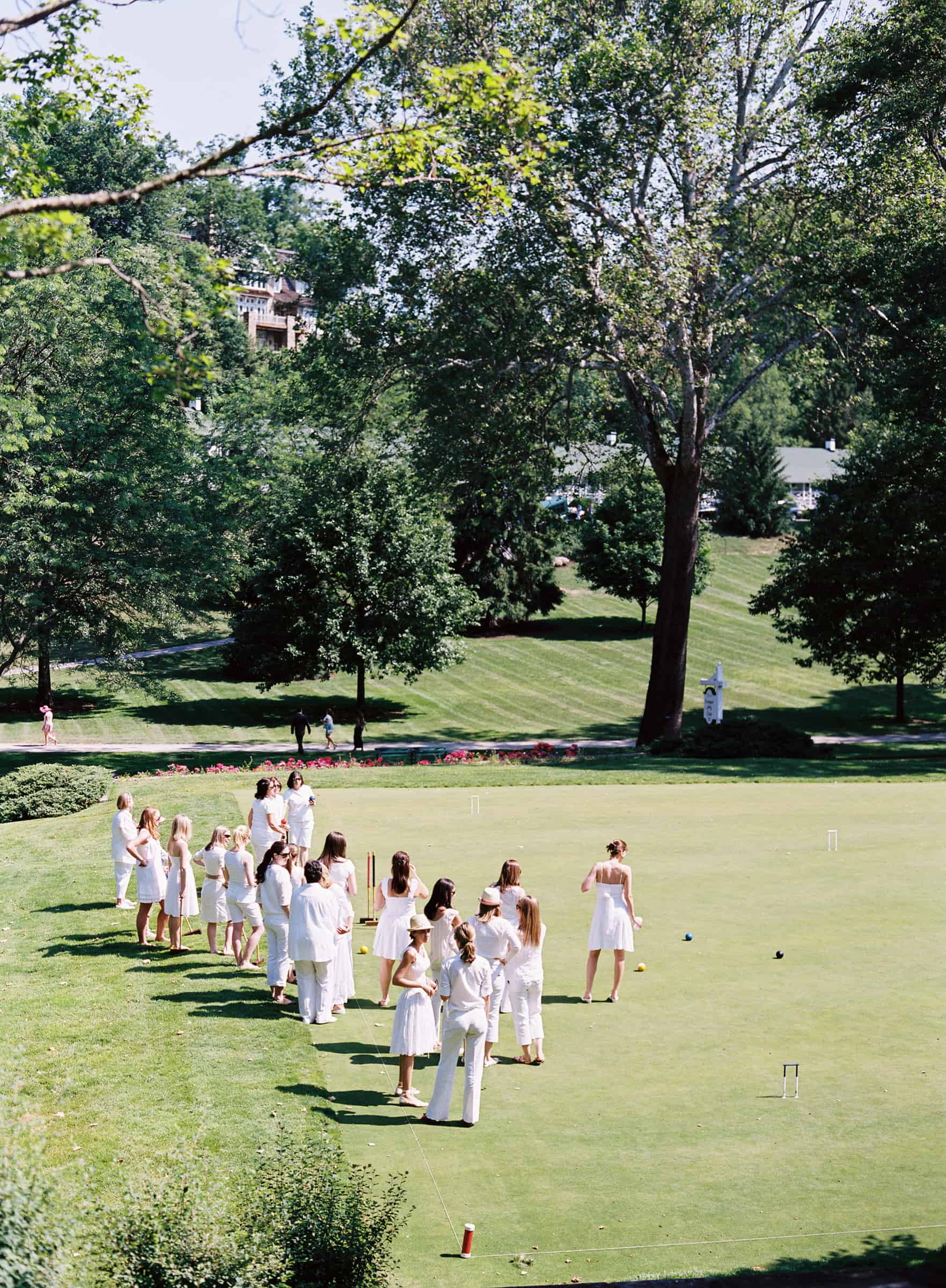 bride and ladies playing croquet