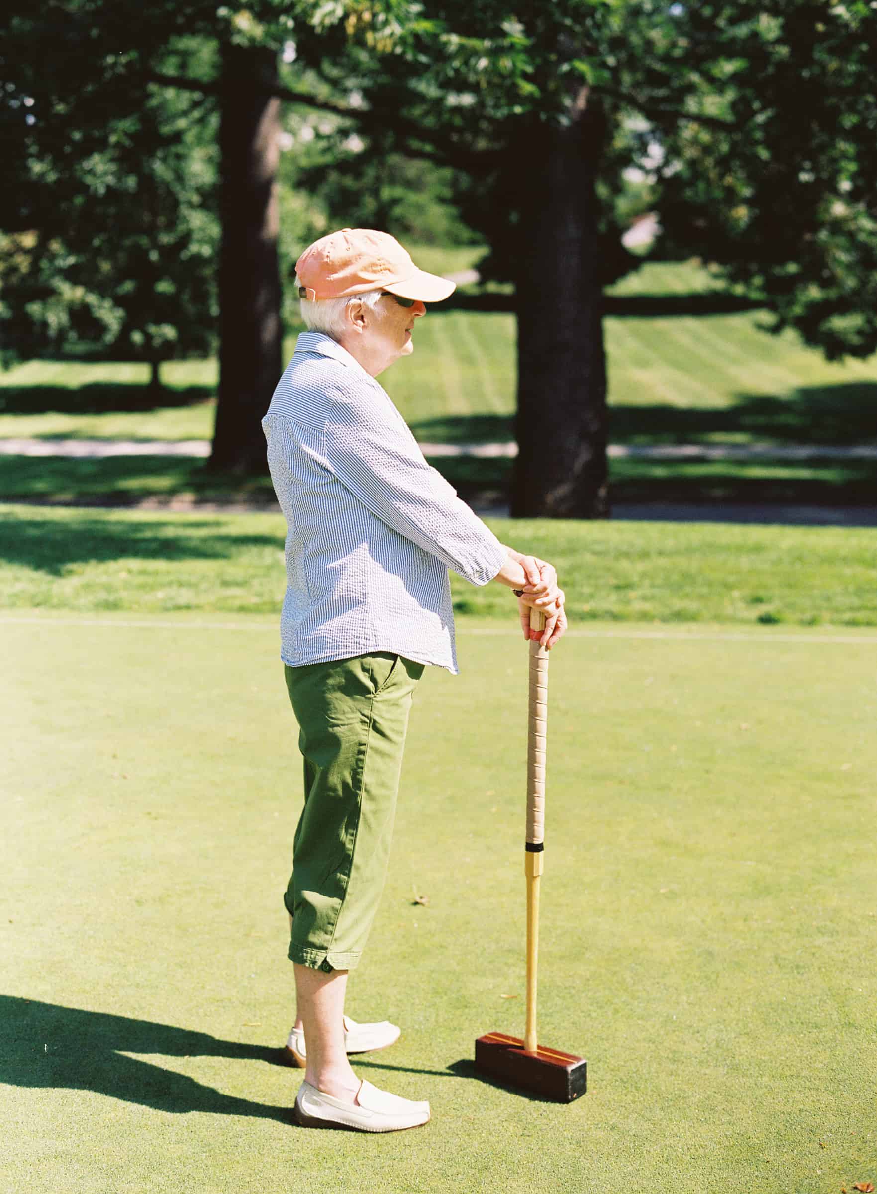 guest playing croquet
