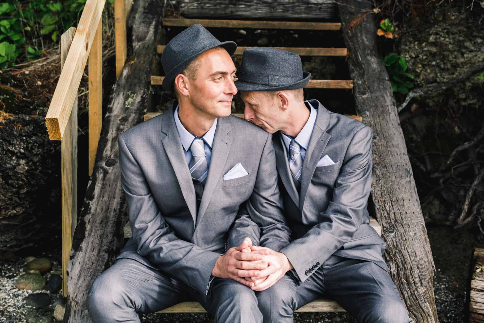 gay wedding couple in matching suits in washington state