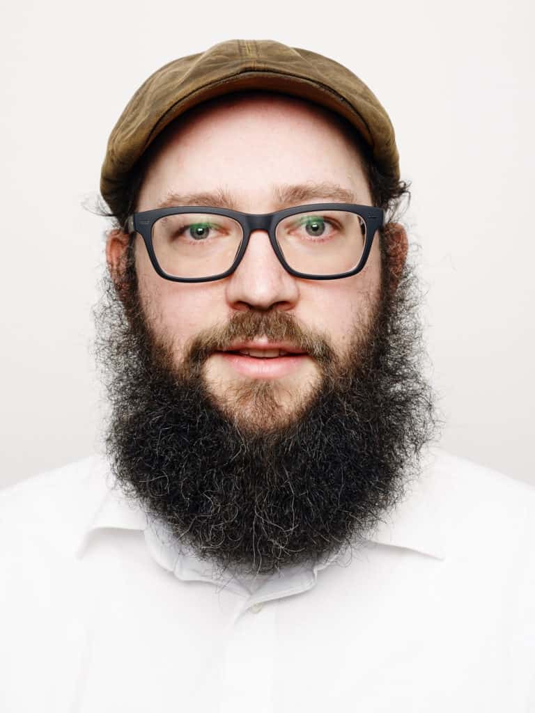 Headshot of man with beard